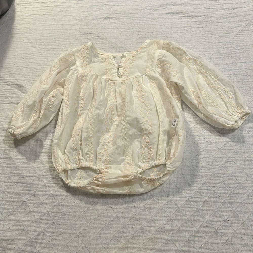WHITE PEARL BUTTON ROMPER